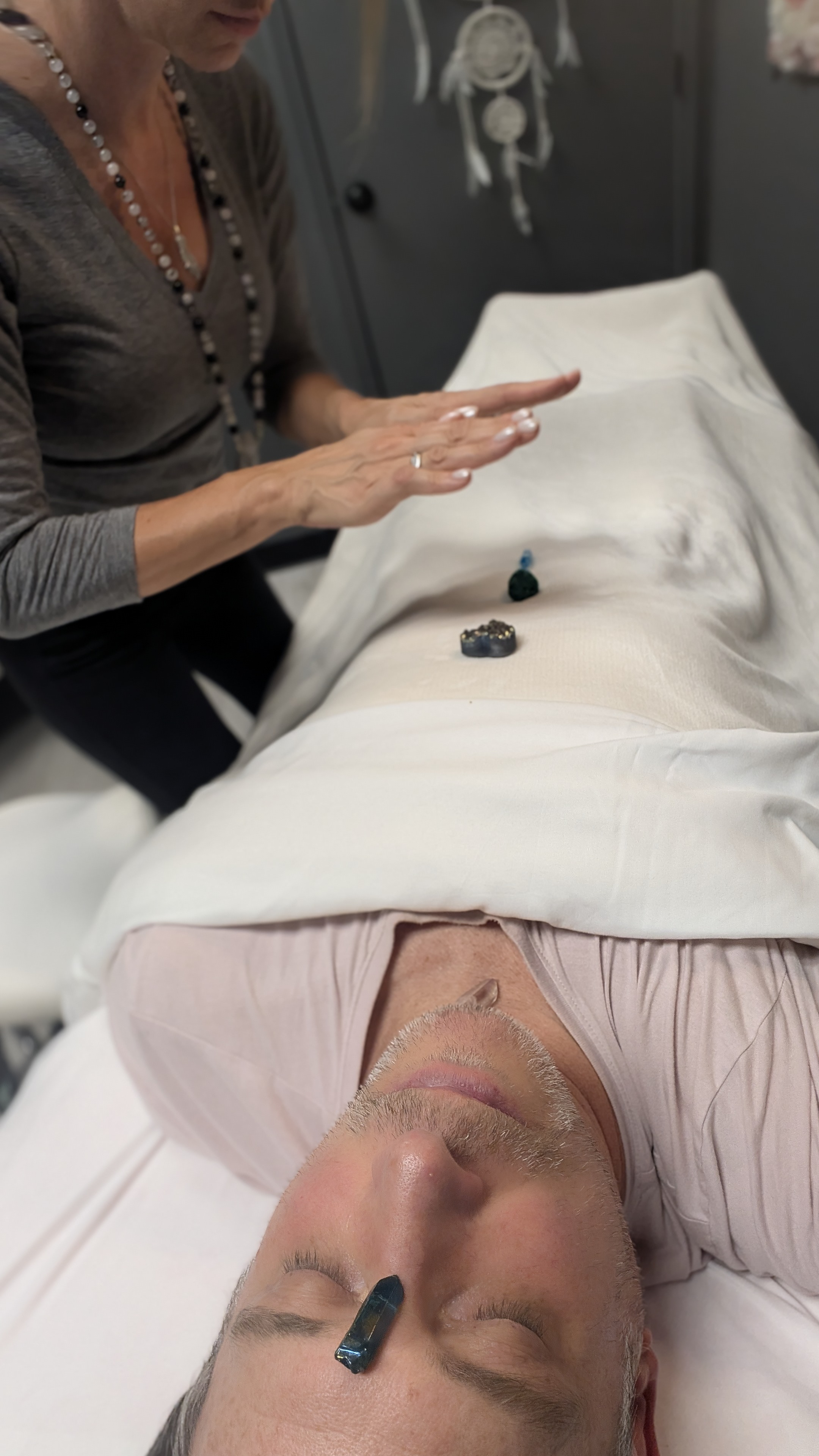 Lara performing Reiki Energy Healing and intuitive spiritual alignment